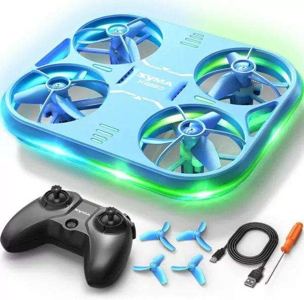 Blue and green LED quadcopter drone with four propellers, a remote control, spare propellers, a USB charging cable, and a screwdriver for assembly.